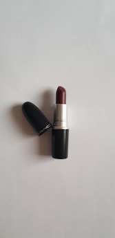 red lipstick on white table