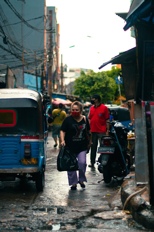 people walking on street during daytime in Jatinegara Indonesia