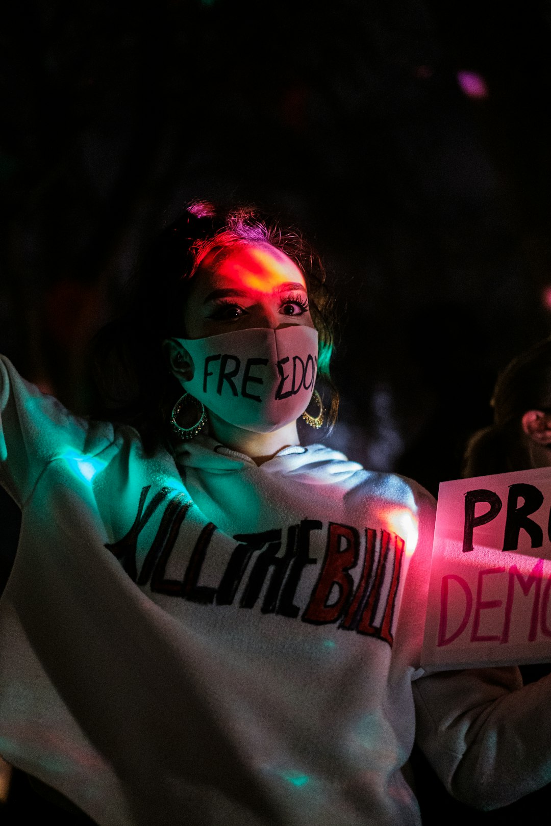 woman in white and black sweater with face paint