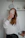 woman in white long sleeve shirt holding iphone 6