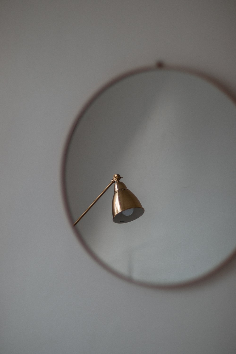 gold pendant lamp on white ceiling