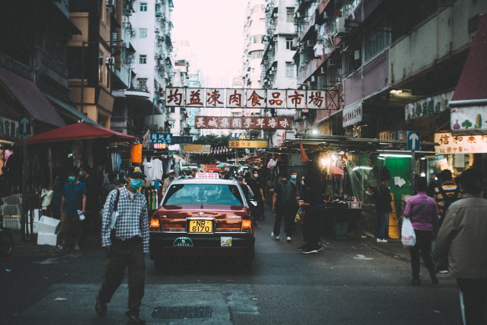 people walking on street during daytime