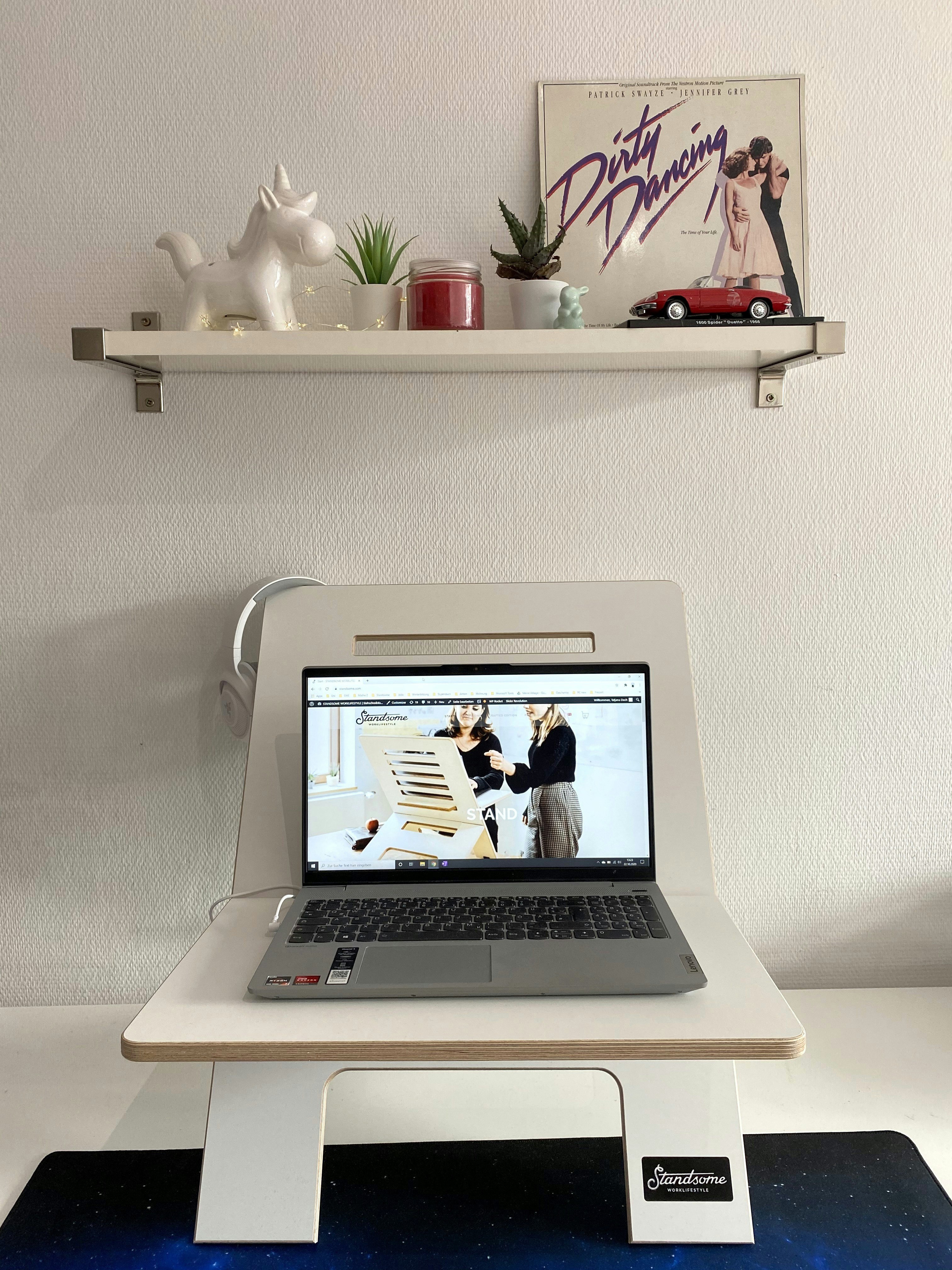 macbook air on white table