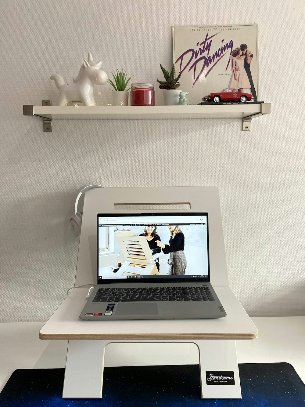 macbook air on white table