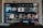A television screen displaying the ESPN+ streaming interface with various sports-related shows and categories. The screen includes sections such as 'Browse by Shows' and 'Best of Drew Brees' with thumbnails of sports programs featuring athletes in action and analysts.