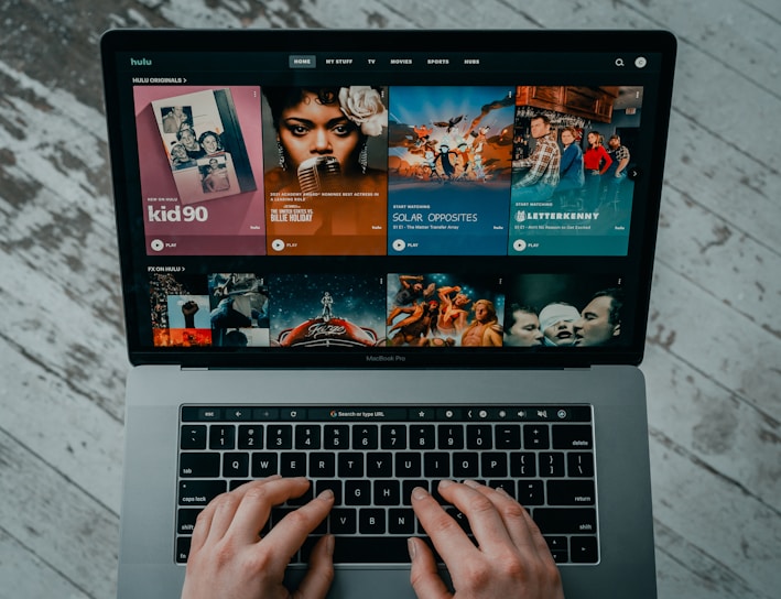 macbook pro on white table