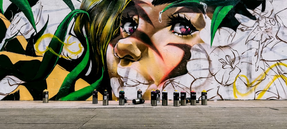 womans face graffiti on wall