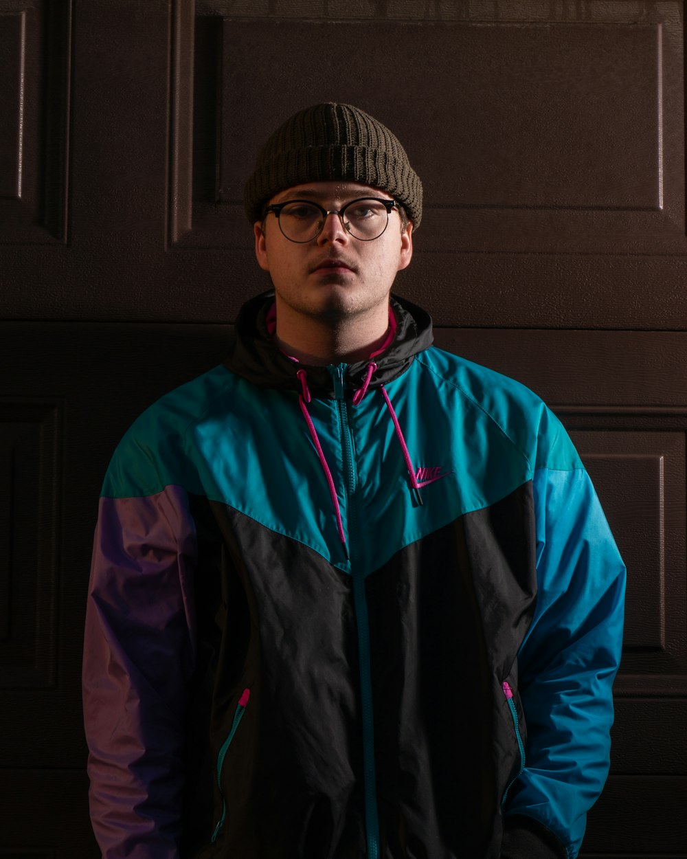 man in blue and red zip up jacket