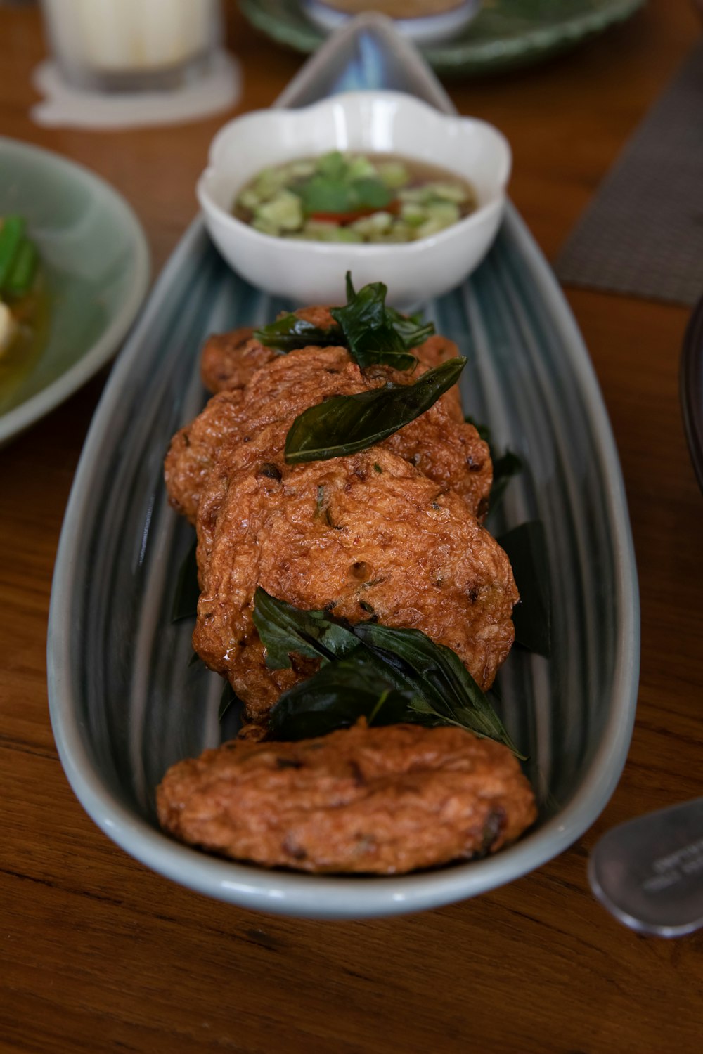 cooked meat on blue ceramic plate