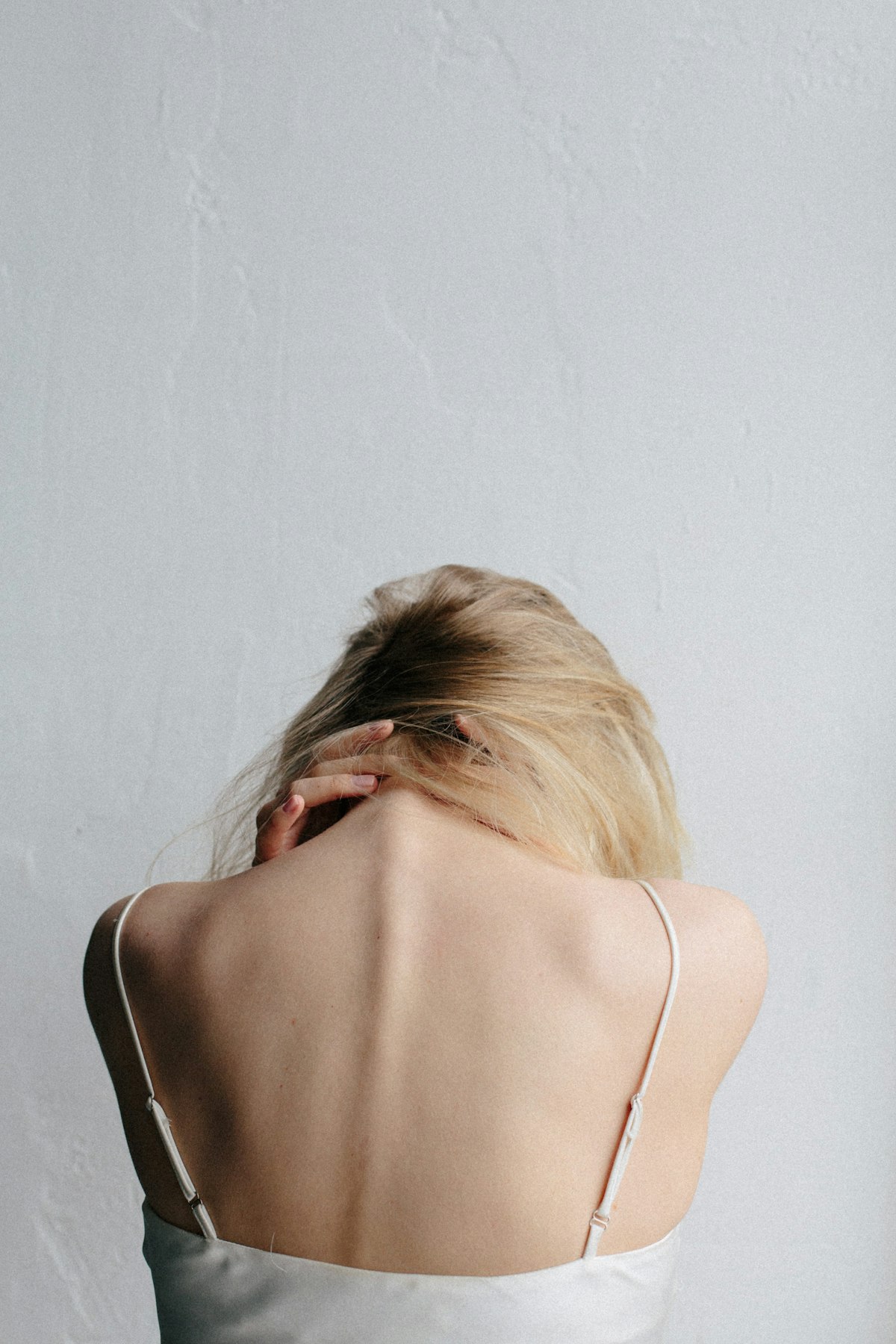 Physiotherapist assessing and treating a patient's shoulder at PHYZFIT Health and Rehab Bexley North Sydney