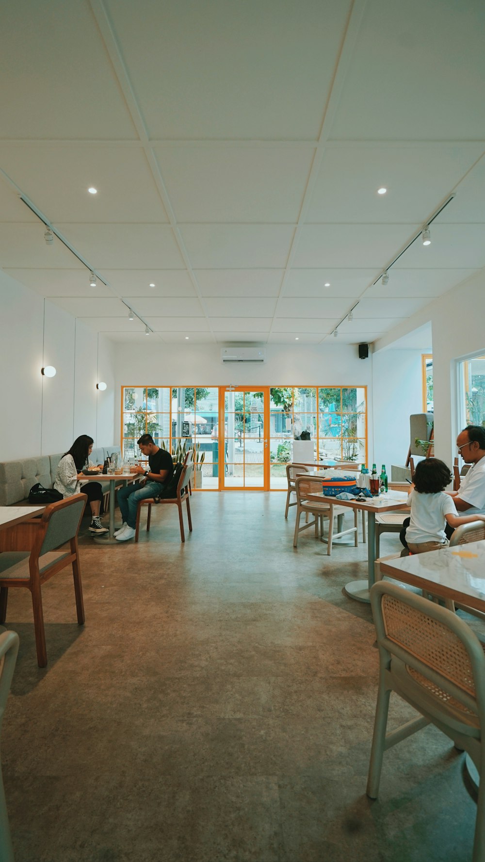 people sitting on chair inside room