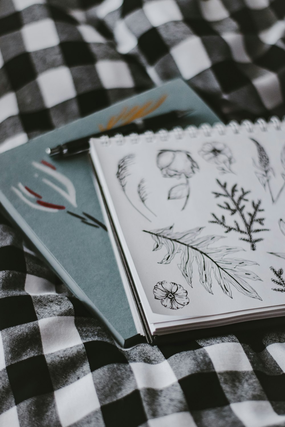 white and black floral book