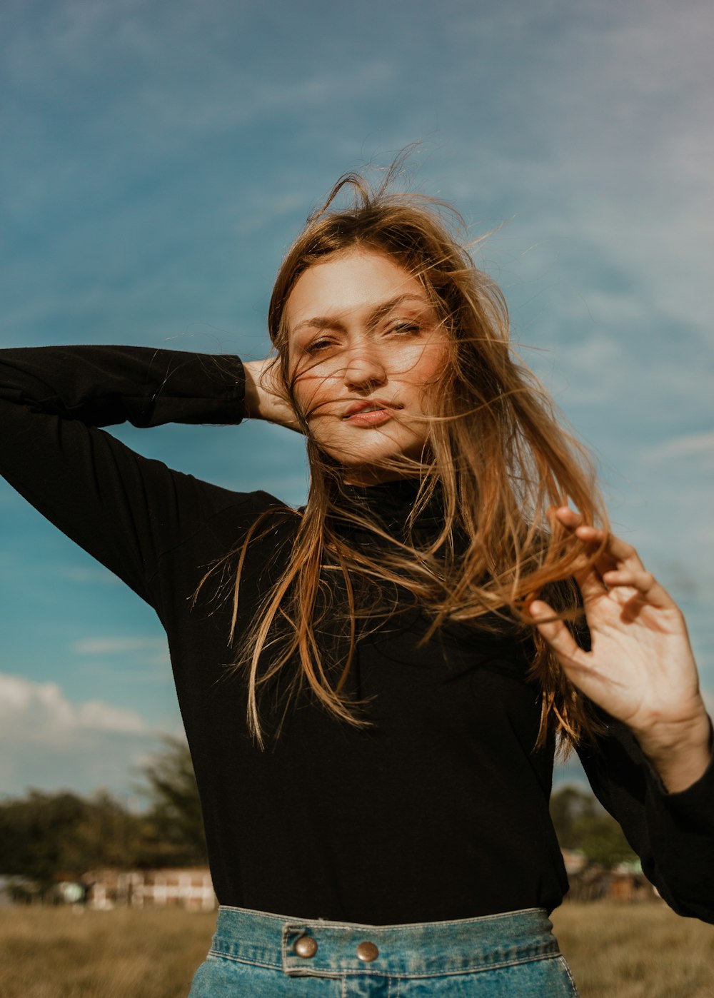 woman in black long sleeve shirt smiling