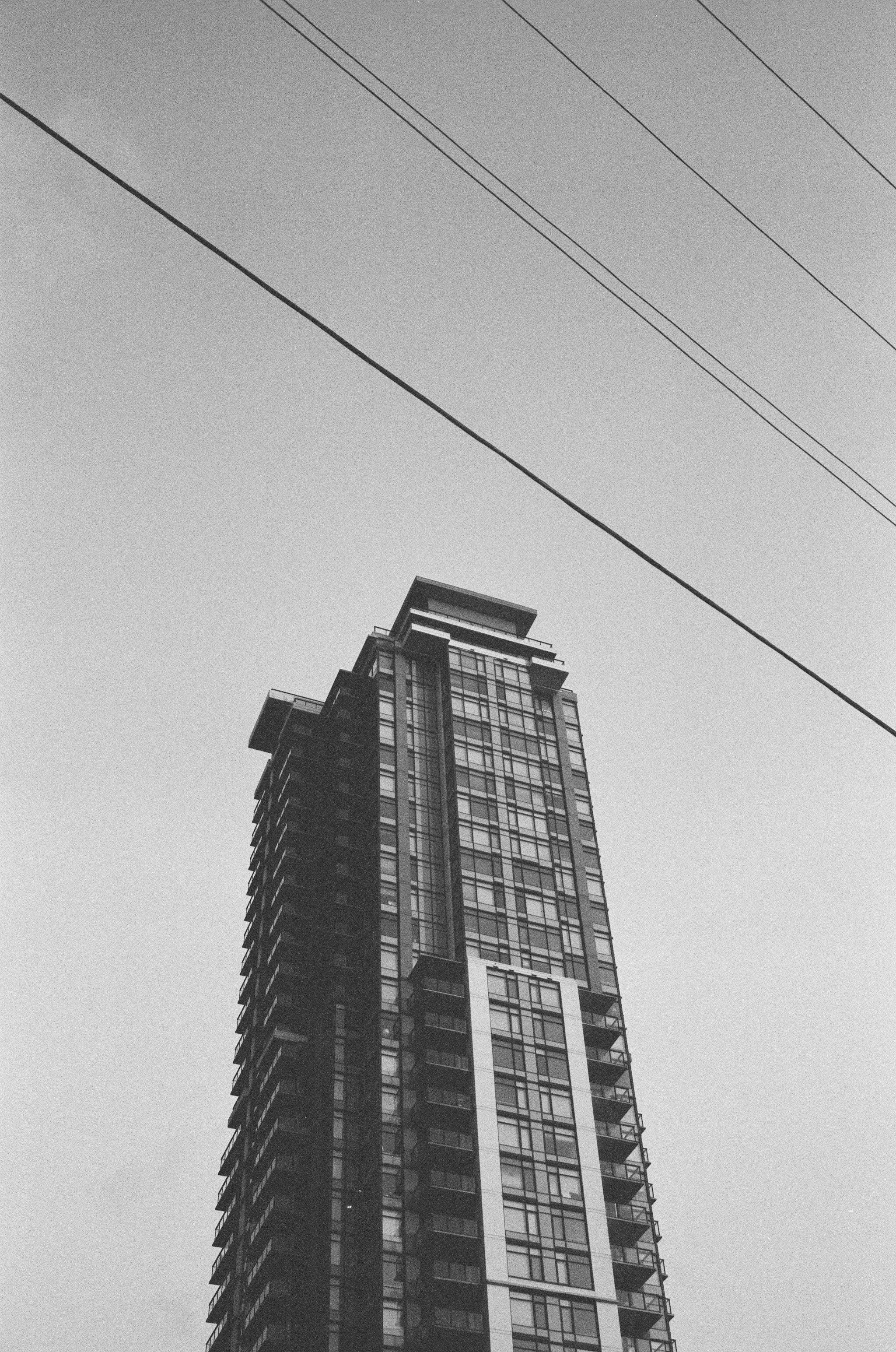 black concrete building under white sky during daytime