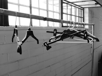 black and gray clothes hangers