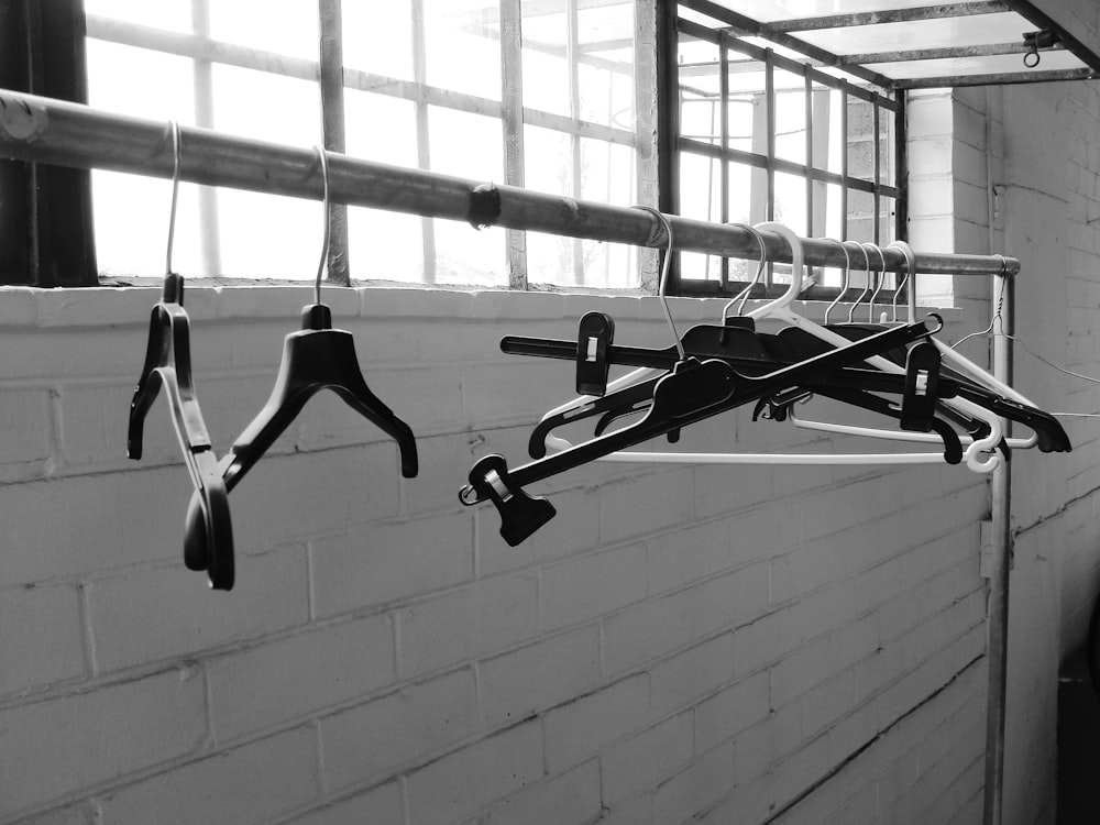 black and gray clothes hangers
