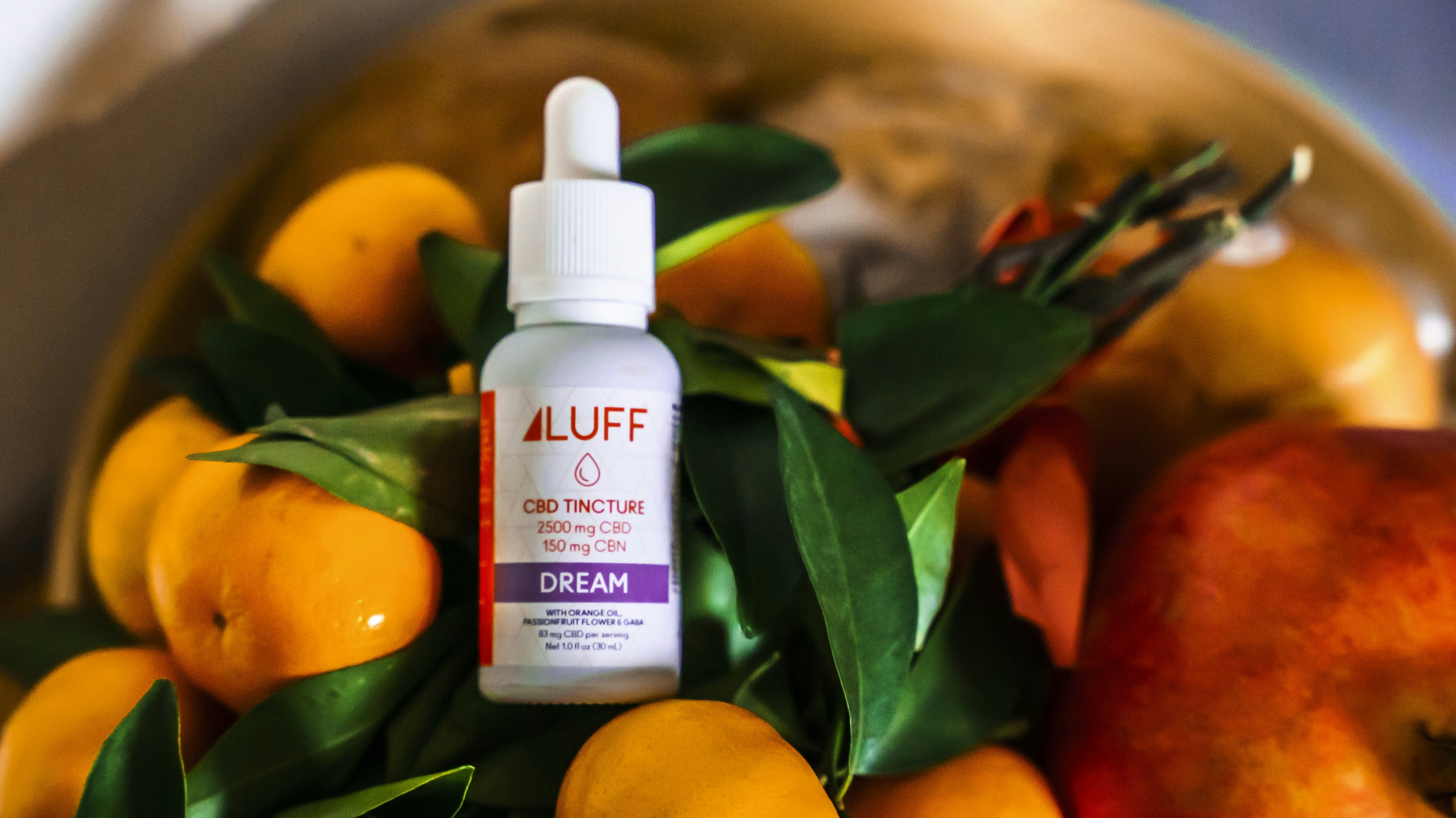 Bouteille en plastique blanche et orange