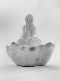 A serene image of Mukesh Baba in a meditative pose.