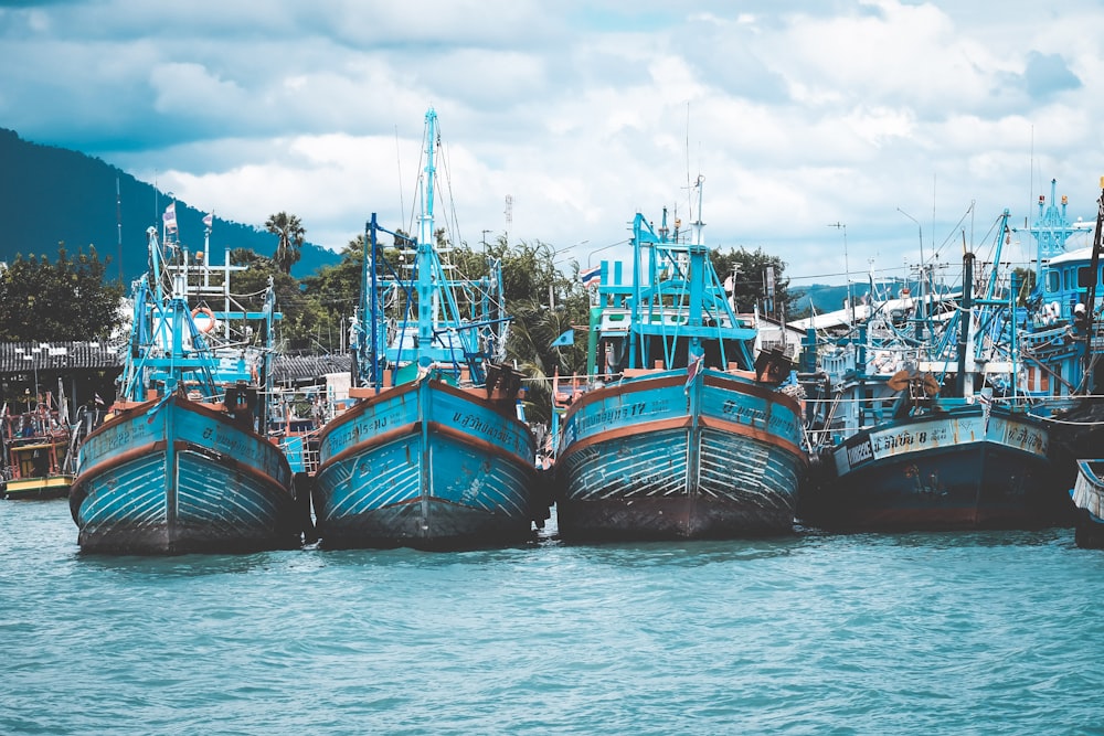 black and brown boat on body of water during daytime