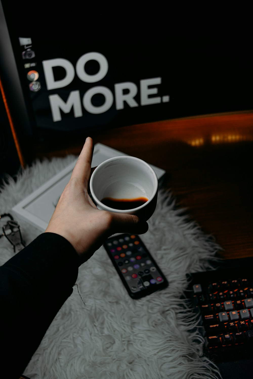 person holding white ceramic mug