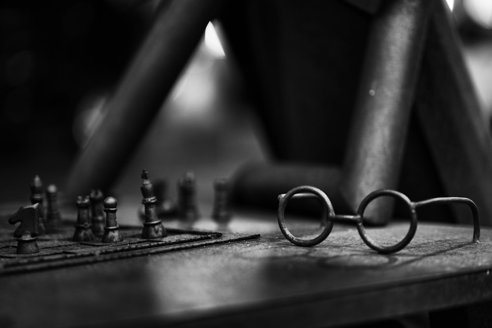 silver and black chess pieces on chess board