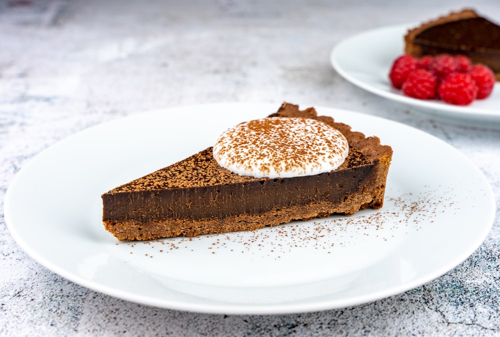 brown and white cake on white ceramic plate