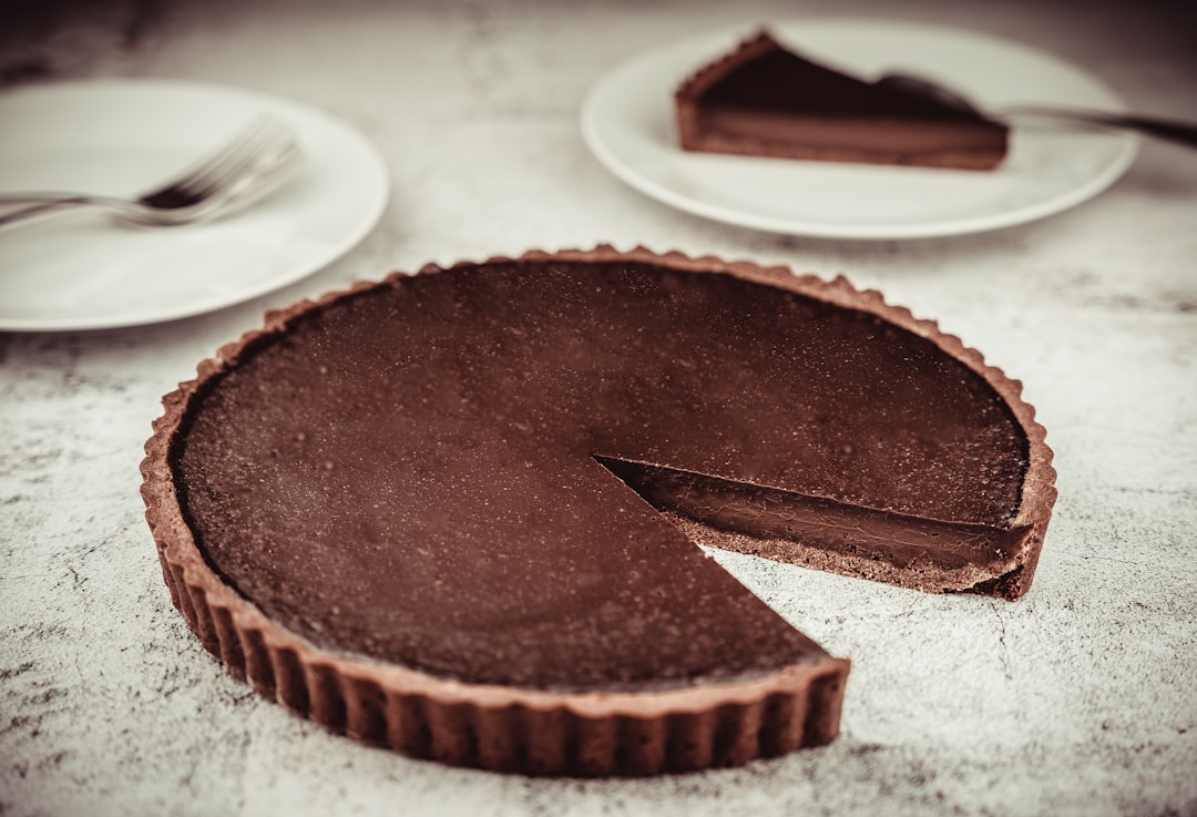 brown cake on white ceramic plate