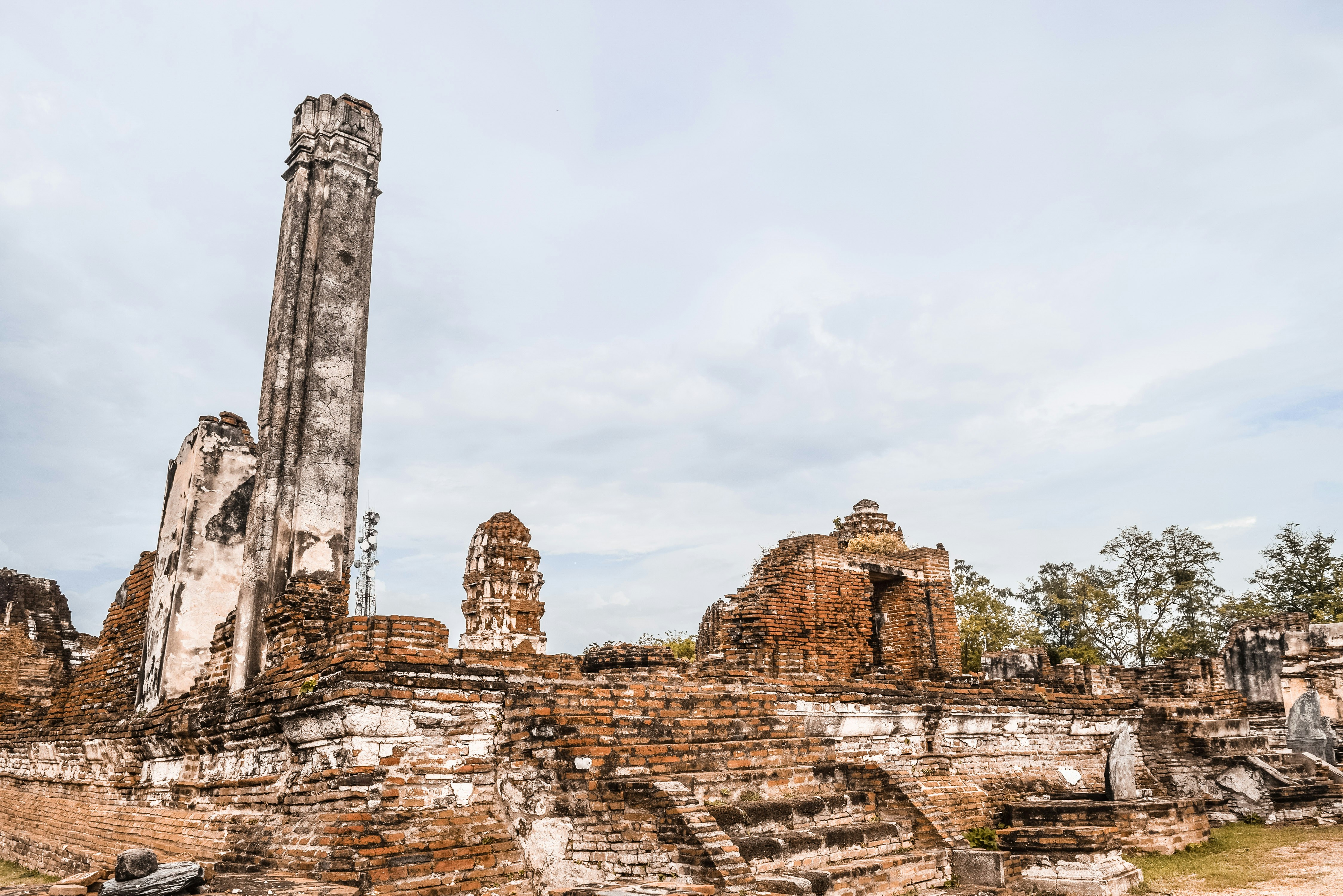 brown concrete ruins under white sky during daytime, 