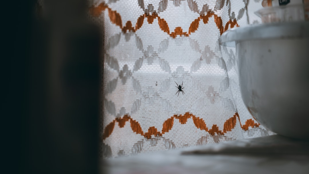 white and brown floral textile