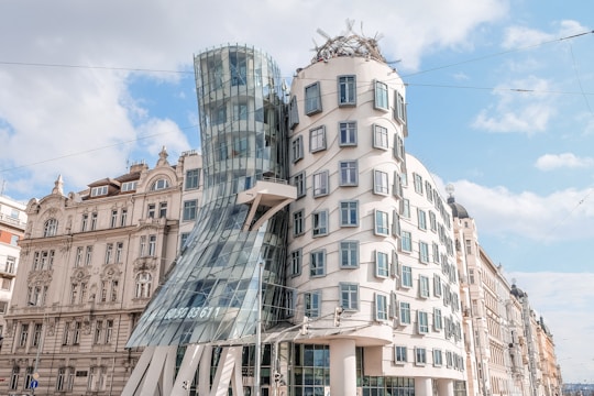 white and brown concrete building under blue sky during daytime