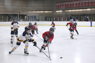A vibrant ice hockey practice session with young athletes in action on the rink