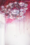 clear glass chandelier turned on in room