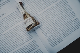 gold ring on white book page