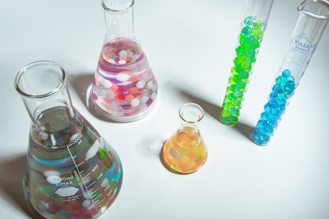 colorful lab equipment on white background