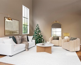 white sofa near green christmas tree