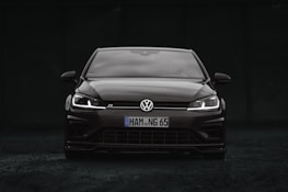 Lifestyle shot of a Volkswagen car featuring PKL centre caps gleaming in the sunlight.