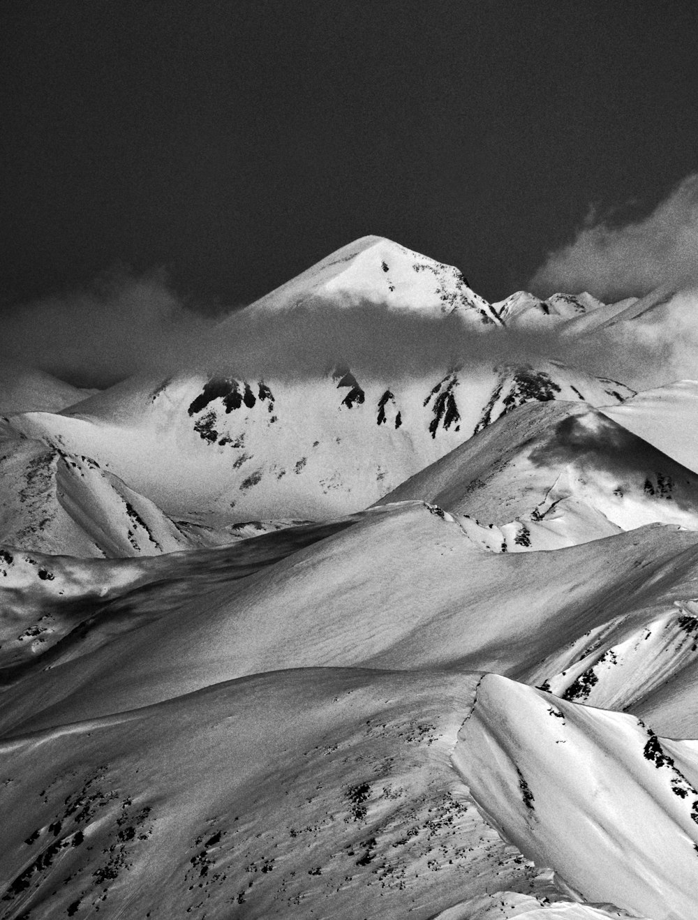 grayscale photo of snow covered mountain