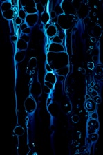 Abstract blue background with subtle geometric shapes representing growth.