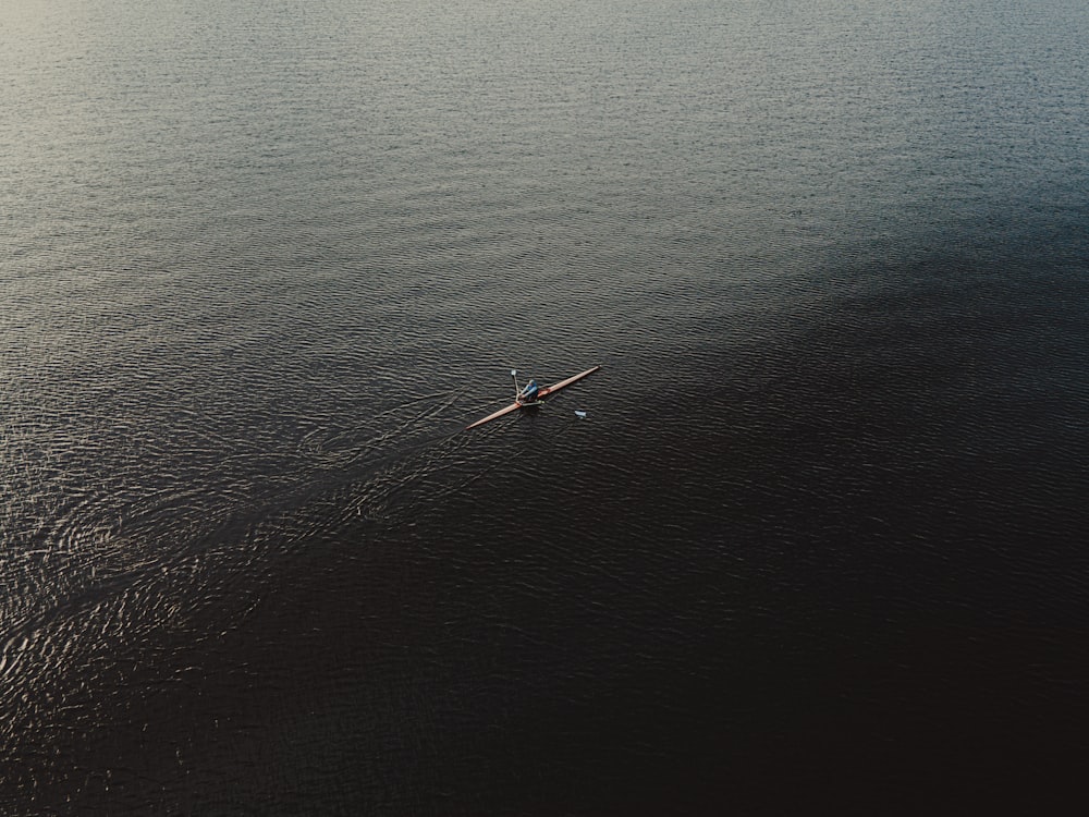 aerial view of boat on sea during daytime