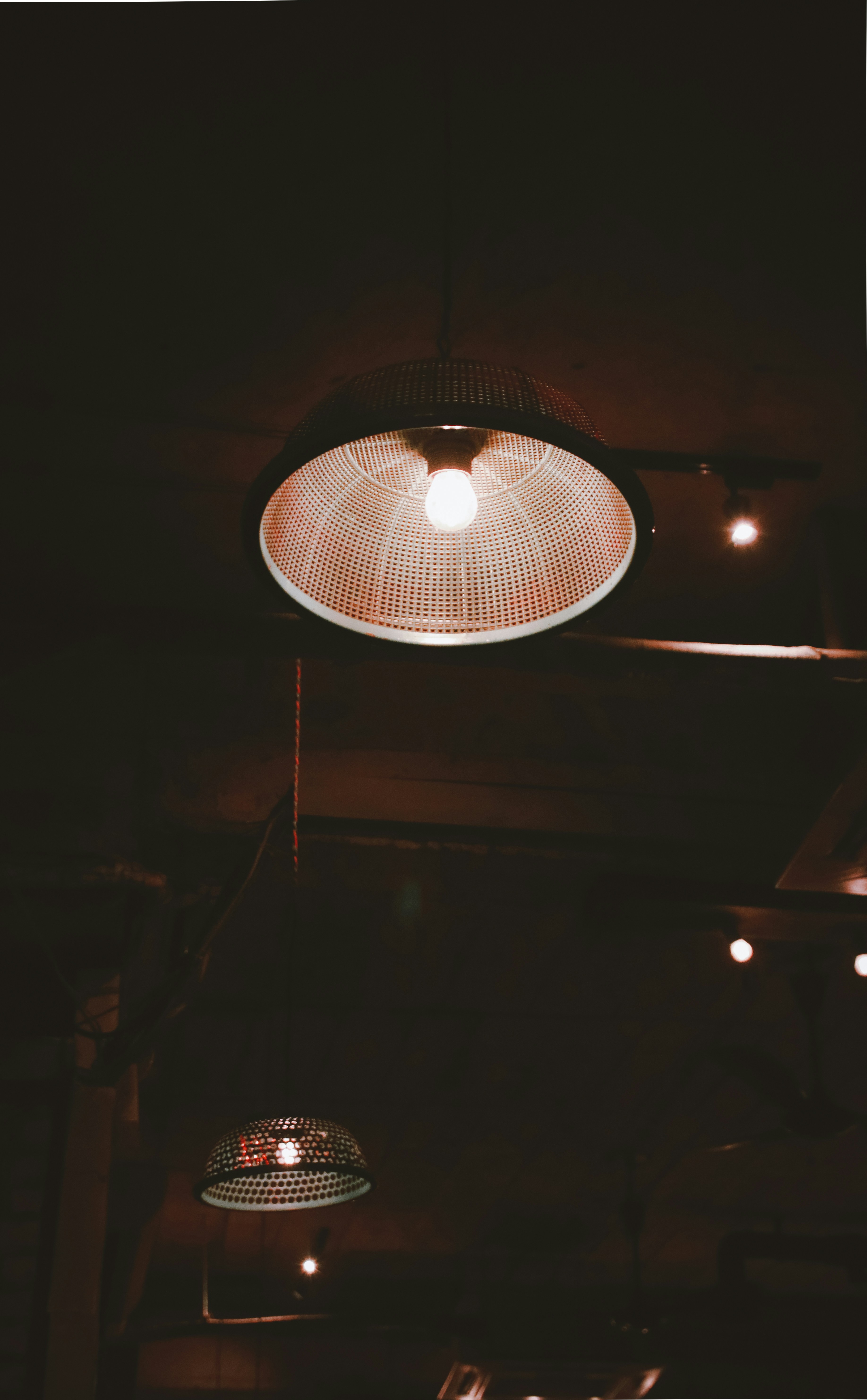 white pendant lamp turned on during nighttime