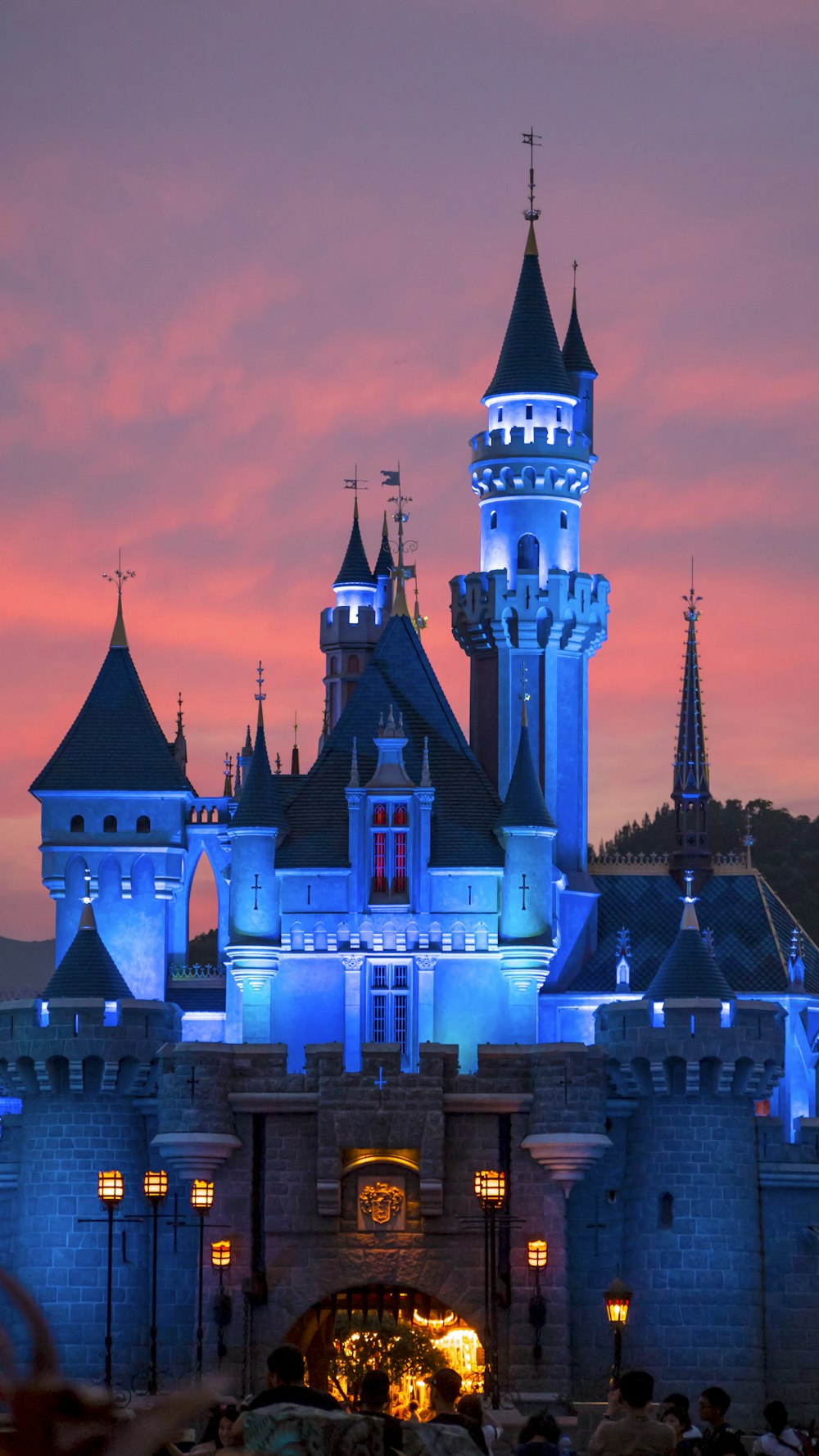 white and blue castle on water