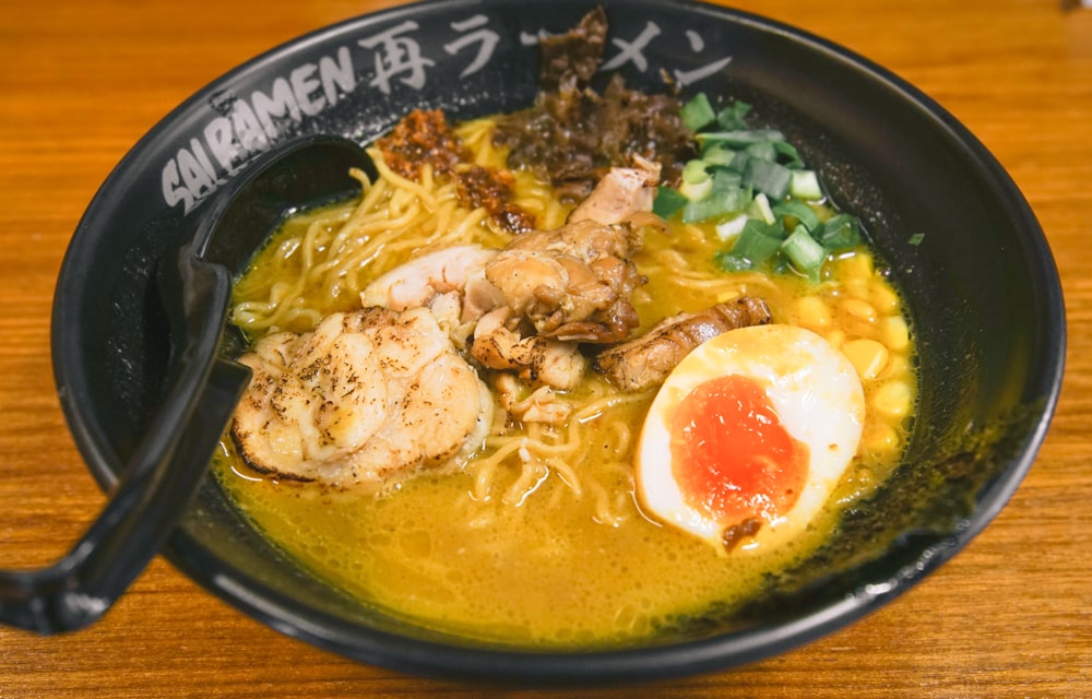 cooked food on black ceramic bowl