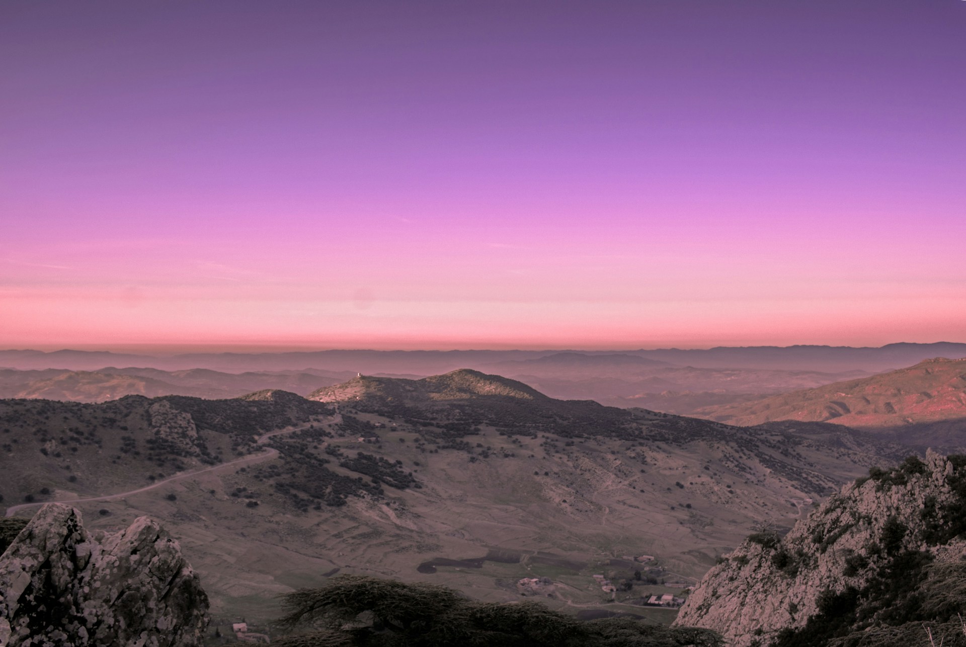 brown and green mountains under blue sky during daytime