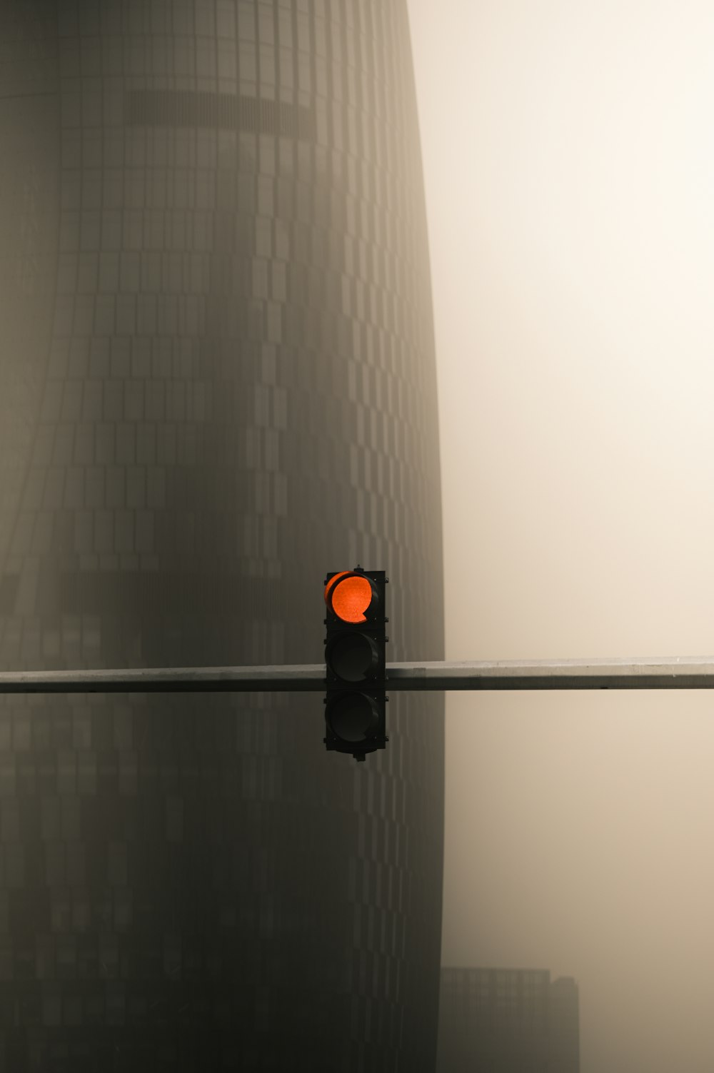 black traffic light turned on during daytime