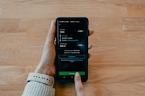 person holding black samsung android smartphone
