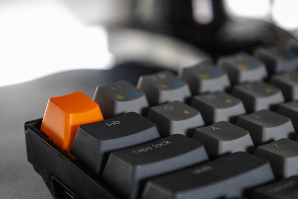 black orange and blue computer keyboard