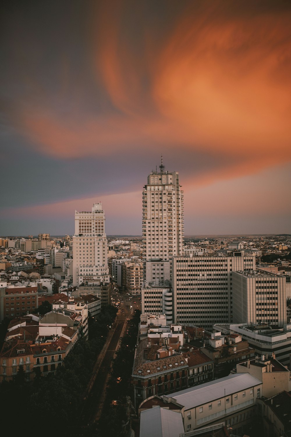 city skyline during orange sunset