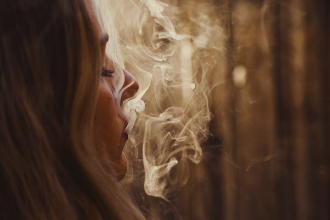 woman with blonde hair looking at the light