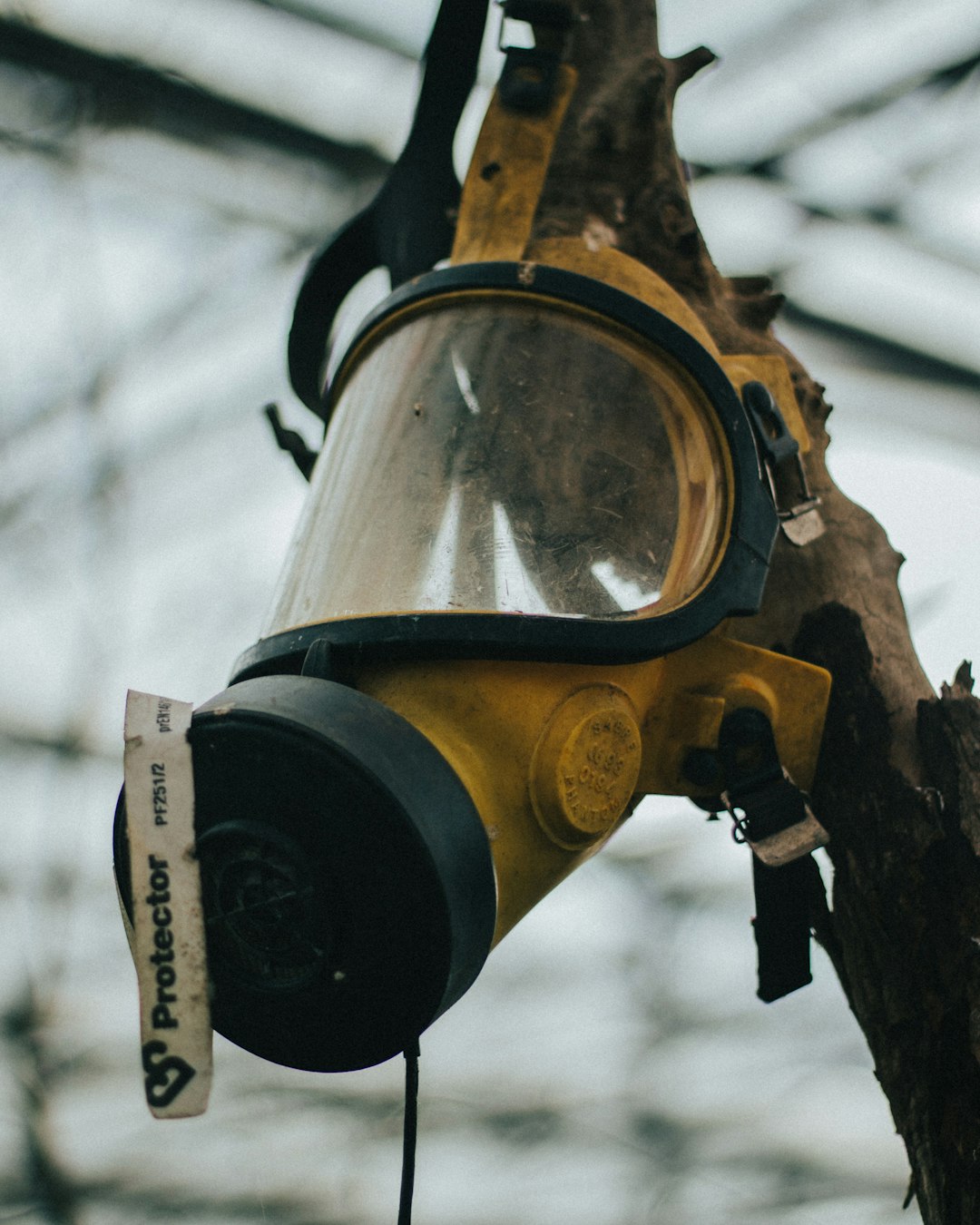 person wearing gas mask and goggles