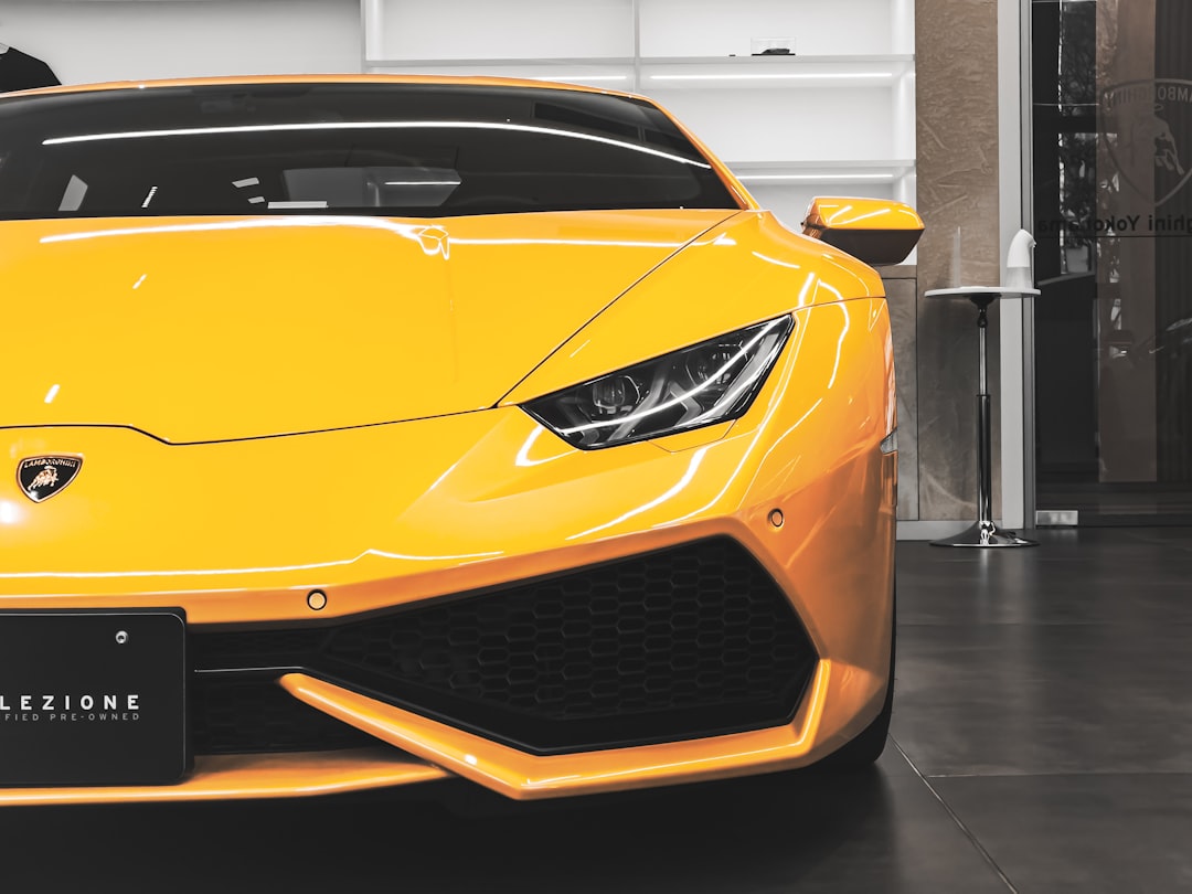 yellow lamborghini aventador in a room